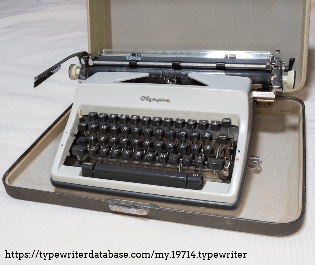 Typewriter in case.