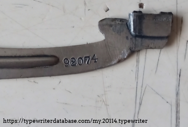 the type levers are provided with the serial number of the typewriter. Surprisingly, only 2 of the 88 type levers are provided with the serial number.
