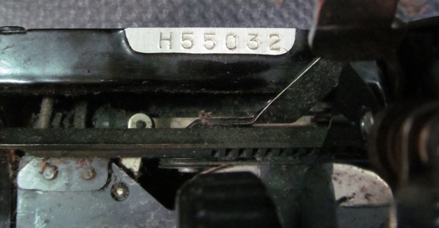 Move the carriage all the way to the right to find the serial number underneath.