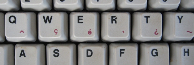 The “Code” key acts as a second shift for a few accents and special characters. Although it has dead-key grave and circumflex accents, it has no acute accent—only an acute-accented E. You can write good French, but in spite of the upside-down question mark, I don’t see how you’re supposed to write in Spanish.