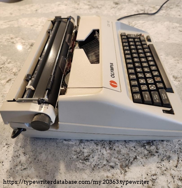 1984 Olympia CE-12 electric typewriter left side view