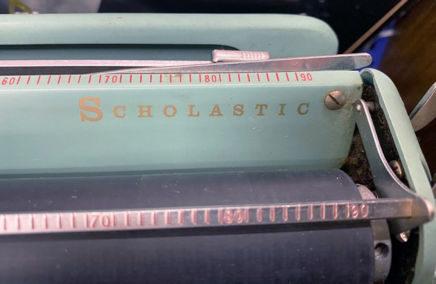 Singer "Scholastic T2" from the model logo on the top...