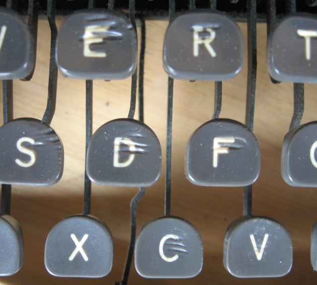 Either someone had ferocious fingernails or these keys have been chewed by rats.