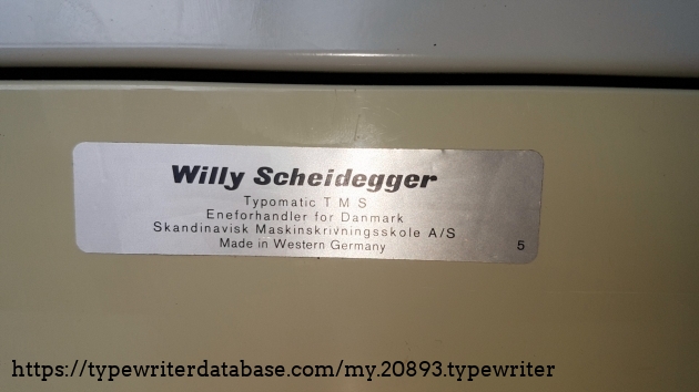 A closer look at the writing on the back, showing Scheideggers' Danish division of the typing school, as well as the Danish company
