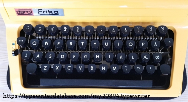 a close up of the keyboard layout, danish keys