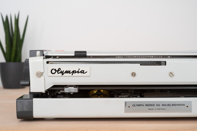 Old Olympia logo on the back of the typewriter and a name/Made in Germany plate.