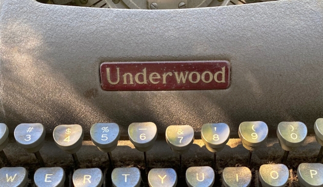 Underwood "Champion" from the logo above the keyboard...