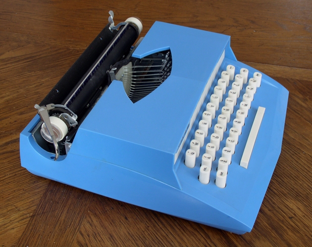 In just looking at this, I thought they could have saved a lot of money by making those keys a half inch shorter, but no, the mechanism needs the full 13/16 inch travel to boost the slug up to the platen!