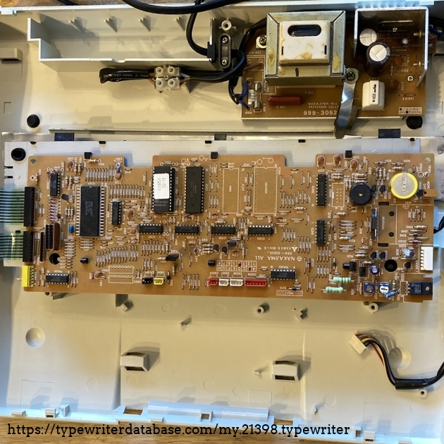 Picture of Main circuit board/keyboard and the PSU.