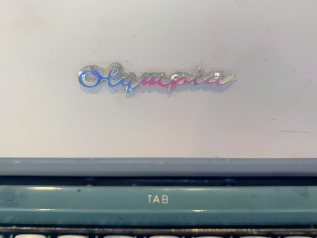Olympia "SG3" from the logo on the front...
