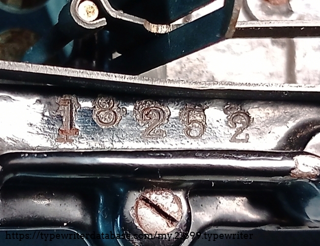 The serial number is stamped under the left frame next to the keyboard and on the front chrome plate that says "Williams" which is attached to the type bars.