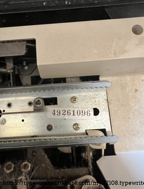 Serial number sticker placement on right side, under the carriage.