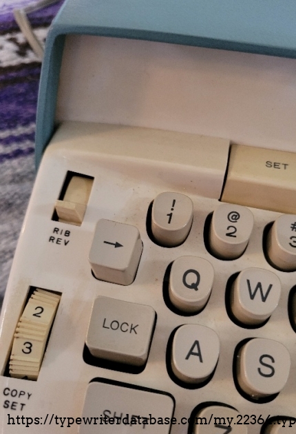 Close-up of left keys, ribbon reverse, tab set, copy set.