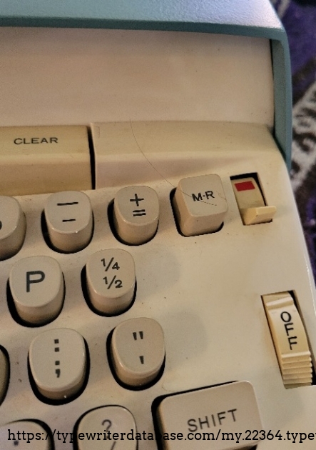 Close-up of right keys, ribbon selector, tab clear, power button.