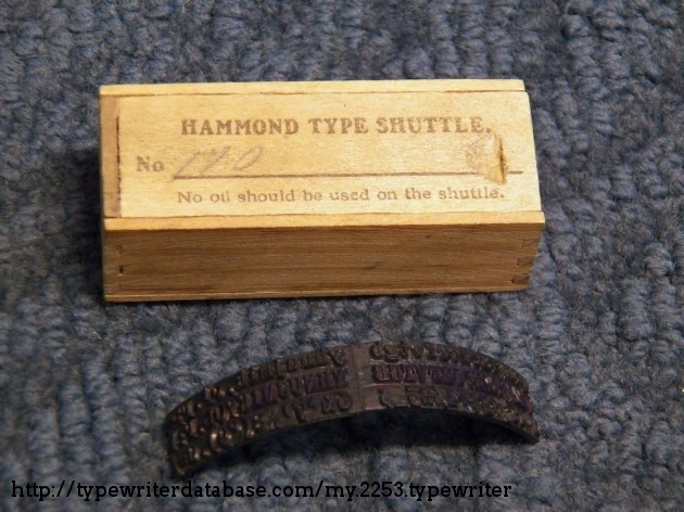 This additional type shuttle is labeled No. 170 and contains the Clarendon font, which was introduced in 1915. "170" actually is marked on the shuttle over an accent character between the 7 and 8 characters. The dovetailed wood box is about 3 inches by 1-1/4 inches.