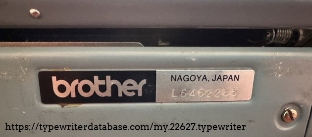 Nameplate revealing that it's actually just a Brother typewriter made in Nagoya, Japan. SN: L6462265