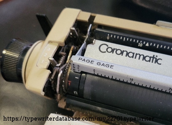 Close-up of left carriage, line spacing lever and Coronamatic branding.