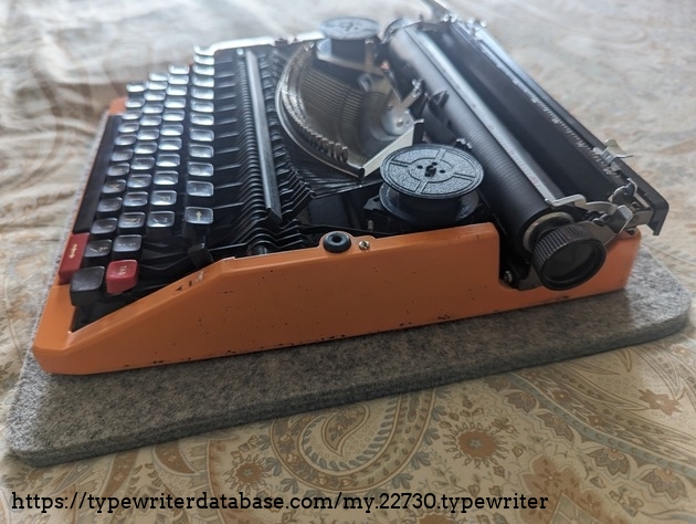 I've replaced this typewriter's grommets that hold the top cover.
