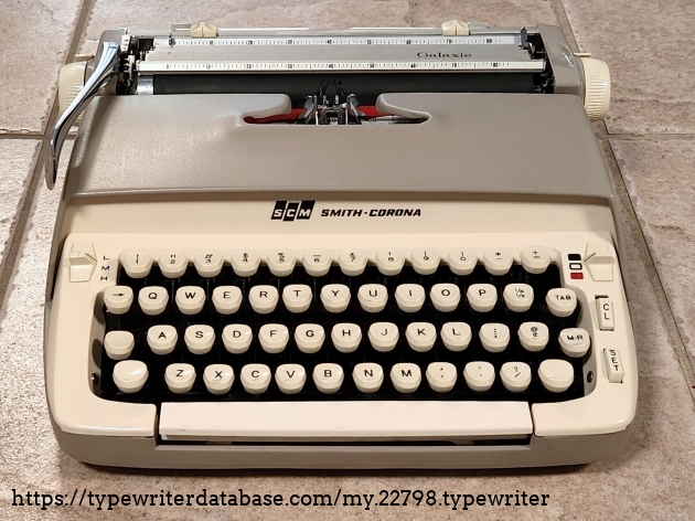 Note the touch control on the left, the ribbon bichrome on the left, and the keyboard set tab stops. The margins are plainly visible at the back of the typewriter and easily moved.