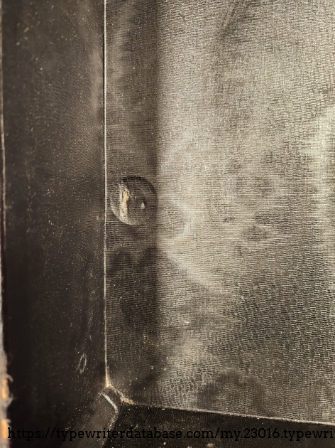 I notices this circle below the fabric in this case. I have no idea why it is there but suspect it may have been an error that was hidden by the fabric.