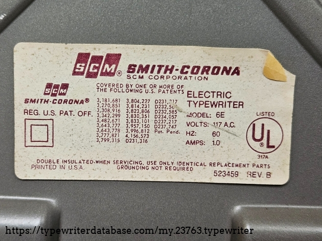 This sticker describes the typewriter as a Model 6E