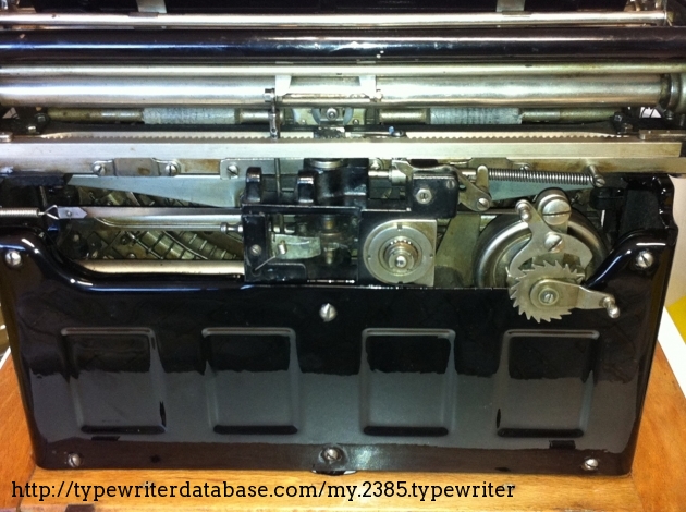 From the back you can see the horizontal escapement wheel. Note the escapement tooth are moving on bearings. The mainsbring is connected to the carriage by a steel drawband and a little spring. This system keeps the same pulling force along the carriage range.