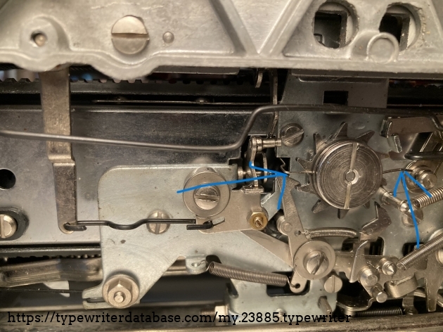 Silencer on left and tab brake on right. Both must rotate freely on the escape nut.