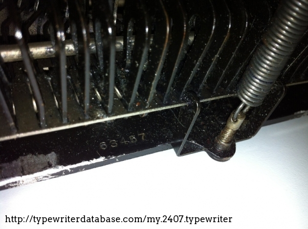 the s/n is written on the bottom interior part of the typewriter.