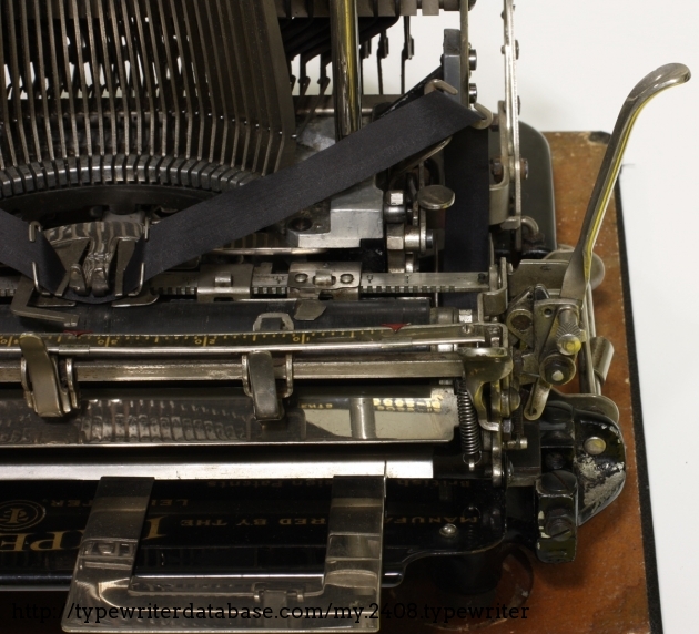 The line spacing is adjustable in two positions, the margin setting is on the front of the platen.