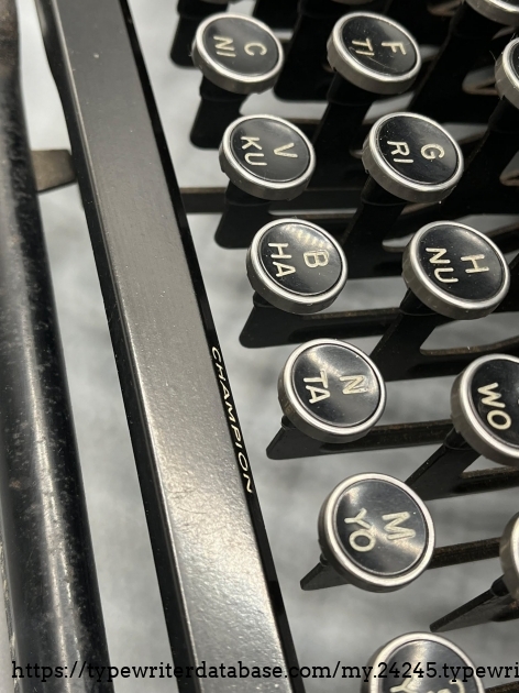 Champion-branded spacebar.