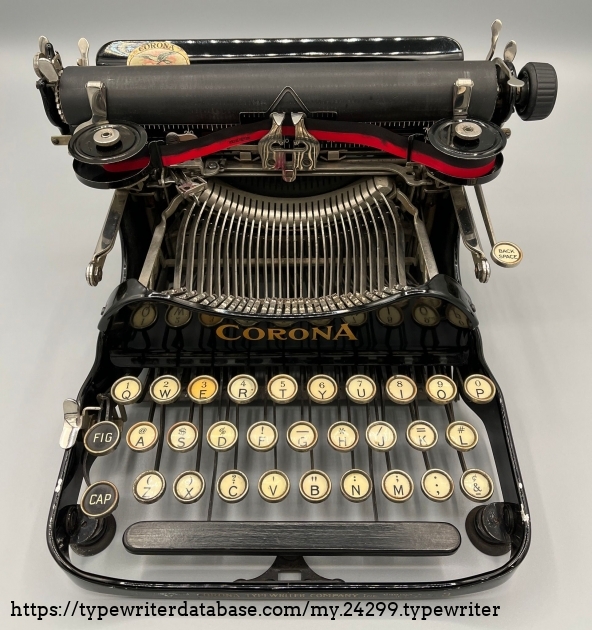 Standard US keyboard.  The typing experience was improved when Corona began using a dedicated period key not long after this machine was made.  The unshifted character on the period key is the comma.