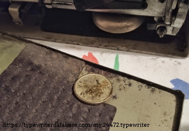 While cleaning the machine, this old 2 Drachma coin dropped from the back of the mechanism.