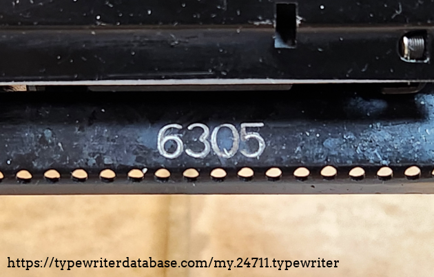 The serial number is visible in two places. This is on the right side of the carriage, on the front rail.