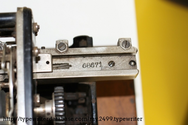 A detail of the serial number located on the carriage rail