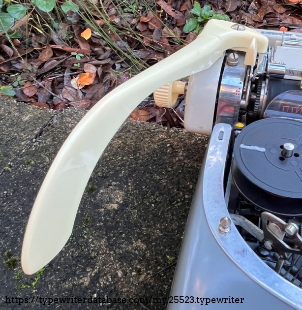 Lever now in typing position