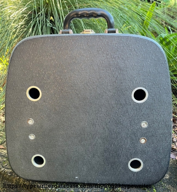 When empty, there are holes in the case for the typewriter feet!