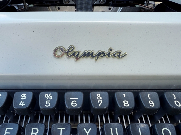 Olympia "SM8" from the logo on the front... Olympia "SM8" from the logo on the front...