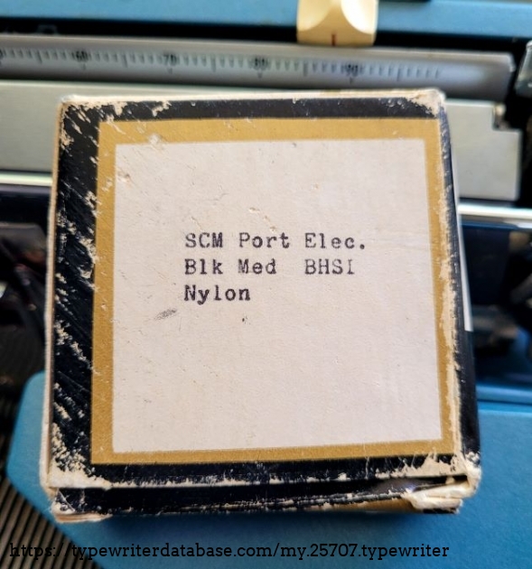 Eaton Allen ribbon on metal spool.
