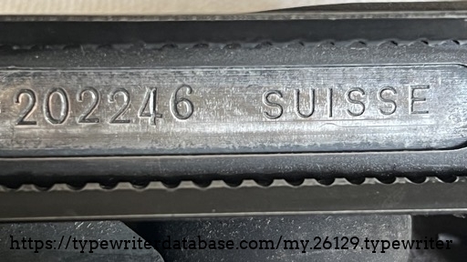 serial plate after cleanup. wet sanded with 400-2500 grit sandpaper, damp shop towel + barkeeper's friend, q-tips,  glass cleaner, and felt dremel polishing disks and cones.