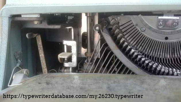 Ribbon feed direction lever and keyboard touch control L, M and, H. Ribbon feed direction lever and keyboard touch control L, M and, H.