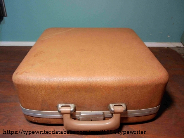 The Holiday case this Typewriter came in.  A little dented, but still  does it's job wonderfully.
