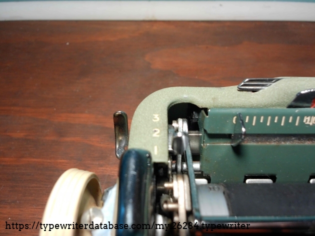 Triple line spacing selector with the patented time saving mechanism.  The return arm rotates the platen as soon as it is moved instead of a dead space that it sinks into before activating.