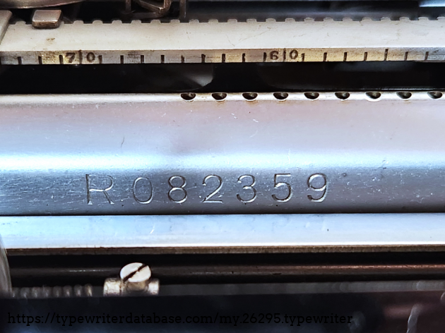 This is the externally visible serial number and can be found on the back left of the unit, visible near the bell.