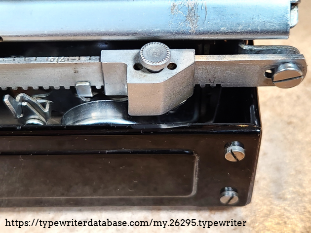 Note that the bell here is directly attached to the margin. Note also that because of the way this margin system works, the margins are backwards to what you would expect. So this, the right-hand margin, is found on the left side of the machine.