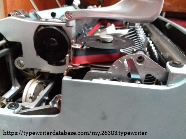 Typebars strike force selector on the interior left side Typebars strike force selector on the interior left side