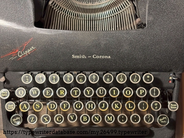 You can see the metal rings on the home row keys are significantly worn, they are no longer silver but worn to the brass.