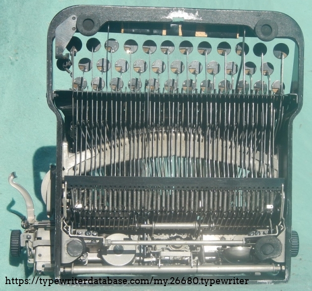 The underside, showing the splinted space bar. The underside, showing the splinted space bar.