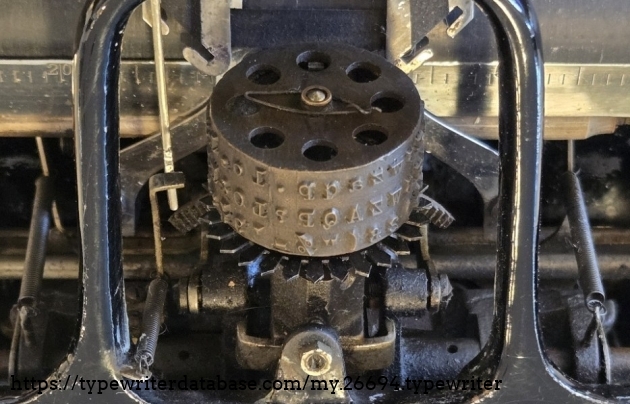The Postal type wheel had the usual 120 years of dirt and "crud".  I had previously tried cleaning a Blickensderfer type wheel in Coca-Cola and it worked well.  The Postal type wheel is also made of Bakelite, so I also used the Coca-Cola, and it cleaned it very well.  The Postal type wheel has the same diameter as the Blickensderfer type wheel; however, it is slightly "taller" and the base is a similar design but has a steel cross instead of the bakelite underside of the Blick. The Postal type wheel had the usual 120 years of dirt and "crud".  I had previously tried cleaning a Blickensderfer type wheel in Coca-Cola and it worked well.  The Postal type wheel is also made of Bakelite, so I also used the Coca-Cola, and it cleaned it very well.  The Postal type wheel has the same diameter as the Blickensderfer type wheel; however, it is slightly "taller" and the base is a similar design but has a steel cross instead of the bakelite underside of the Blick.