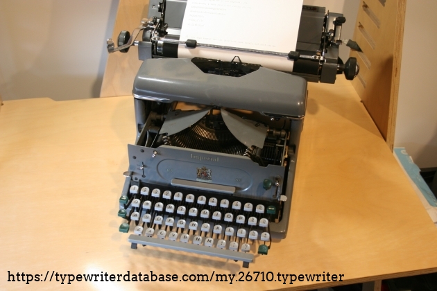 The assembled typewriter, with keyboard extended out The assembled typewriter, with keyboard extended out