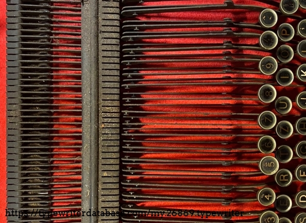 The keyboard removed from the the frame and before disassembling